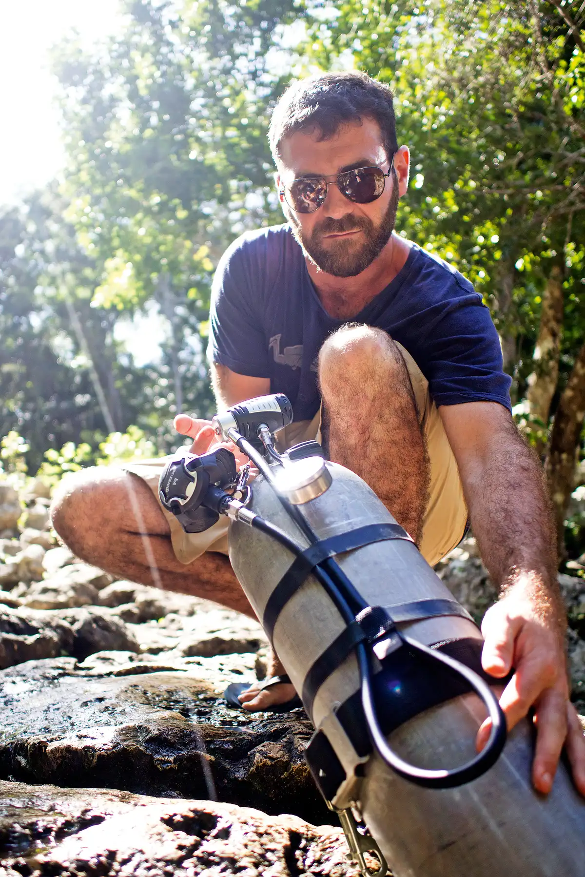 Diver preparing rescue equipment before a dive