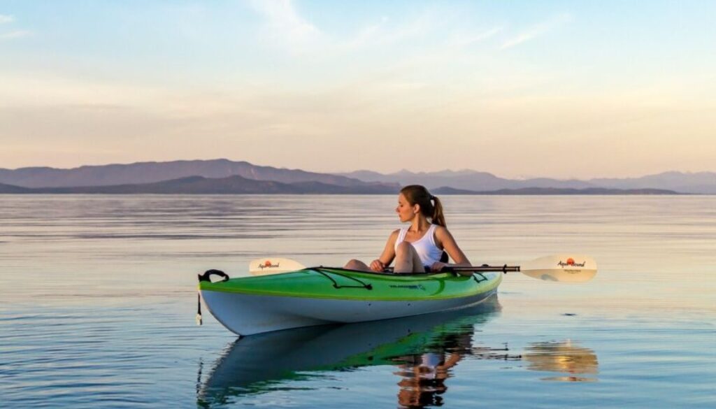 girl-kayaking-in-ocean