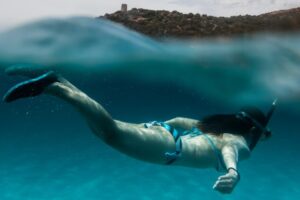 A lady is snorkelling in Andaman
