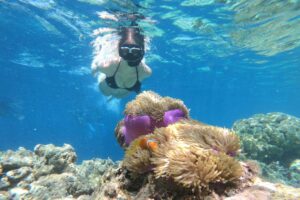 girl-snorkeling-in-ocean