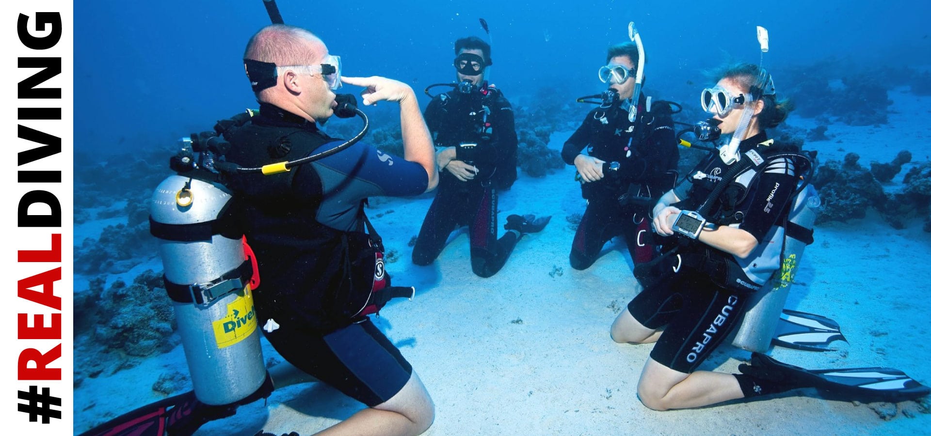 Three student learning scuba diving in Havelock